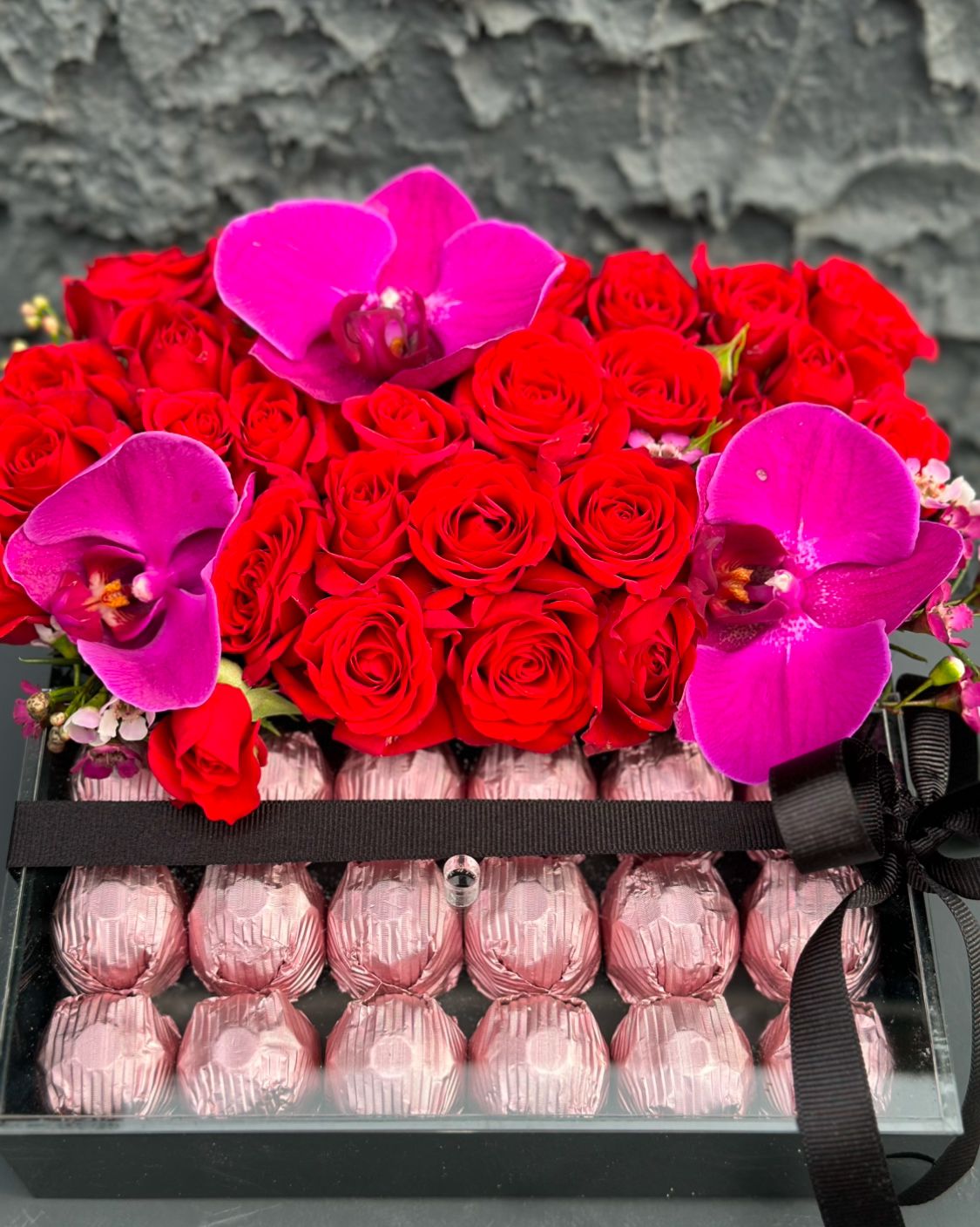 Box of red roses and chocolates